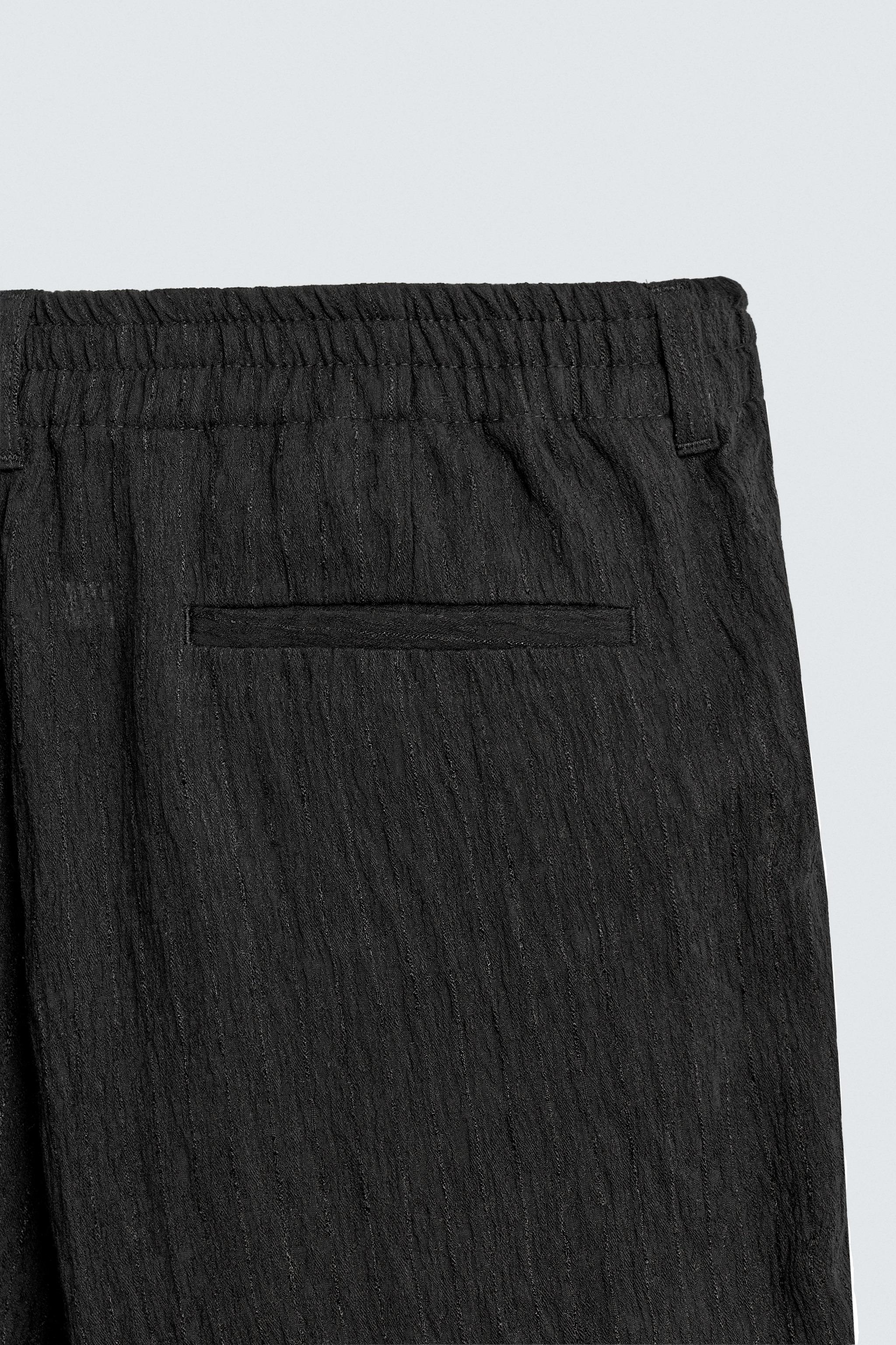 PANTALON REGULAR FIT À STRUCTURE IRRÉGULIÈRE